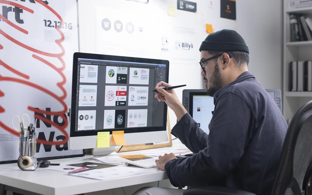 A graphic designer working in office
