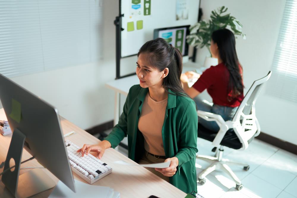 Two female web designers in an office