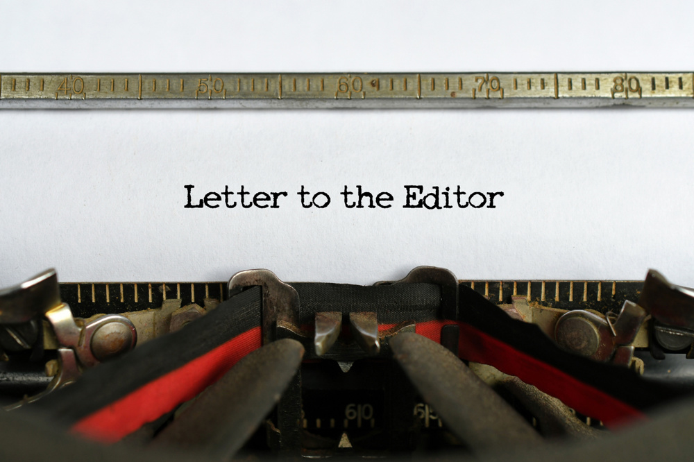 Letter to the Editor words typed on a sheet of paper in a vintage typewriter, concept