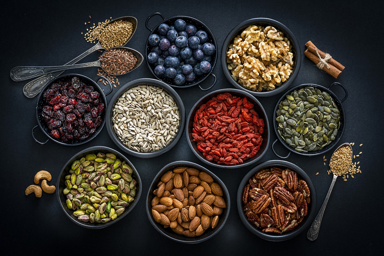 Healthy eating: assortment of nuts, seeds and fruits. Top view.